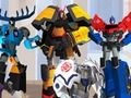 Spiel Transformatoren. Verkleidete Roboter: Fraktion tritt gegeneinander an  Online